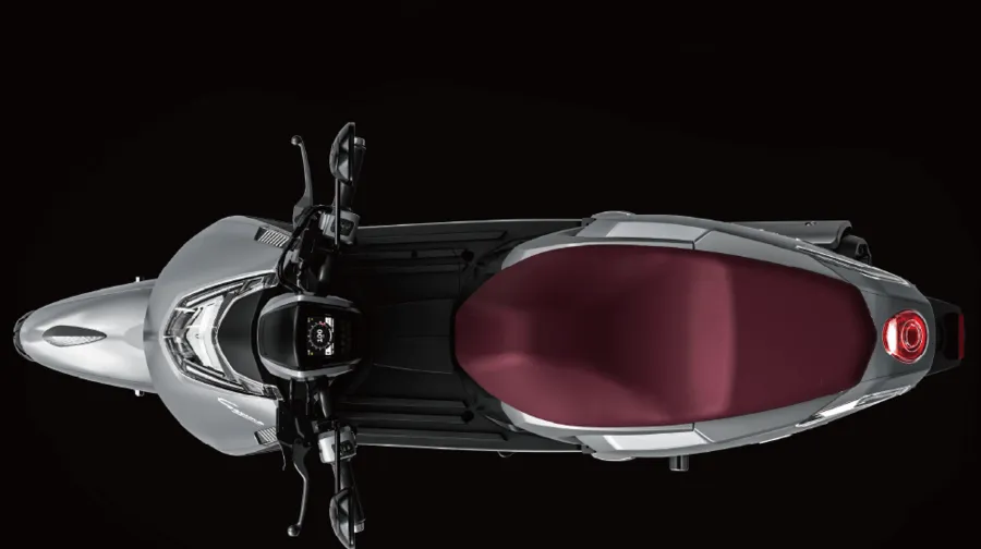 Gemma from above, showing the gem-red leather seat